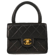 Chanel 1991-1994 Black Lambskin Micro Classic Flap Handbag
