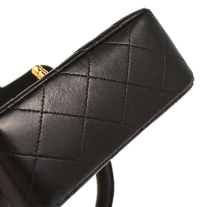 Chanel 1991-1994 Black Lambskin Micro Classic Flap Handbag