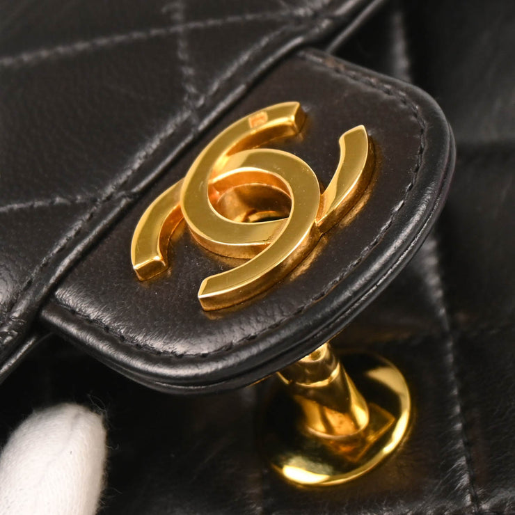 Chanel 1991-1994 Black Lambskin Micro Classic Flap Handbag