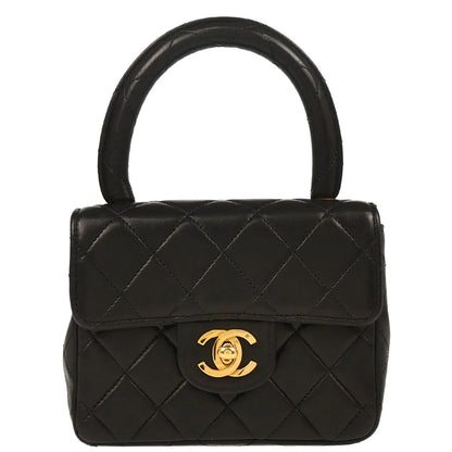 Chanel 1991-1994 Black Lambskin Micro Classic Flap Handbag