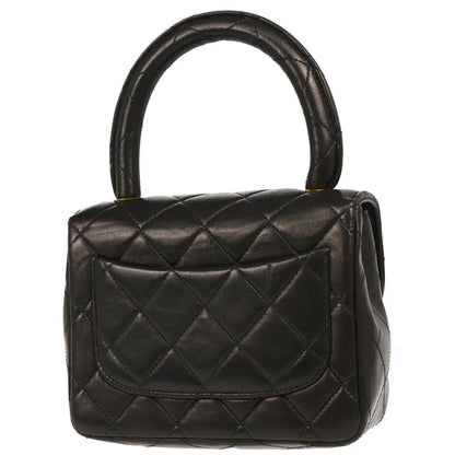 Chanel 1991-1994 Black Lambskin Micro Classic Flap Handbag