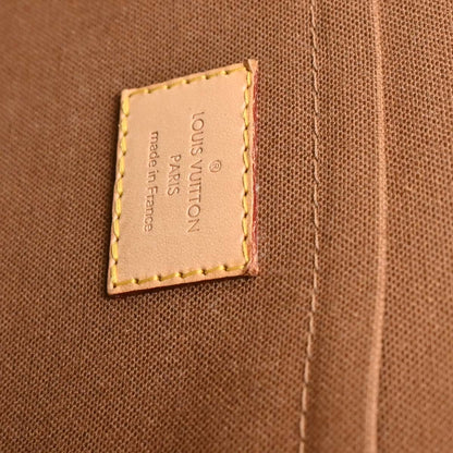 Louis Vuitton 2007 Monogram Riveting Handbag M40140