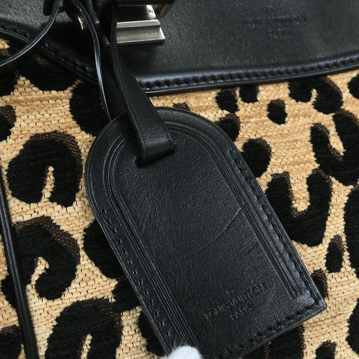 Louis Vuitton 2012 North South Leopard Handbag M94258