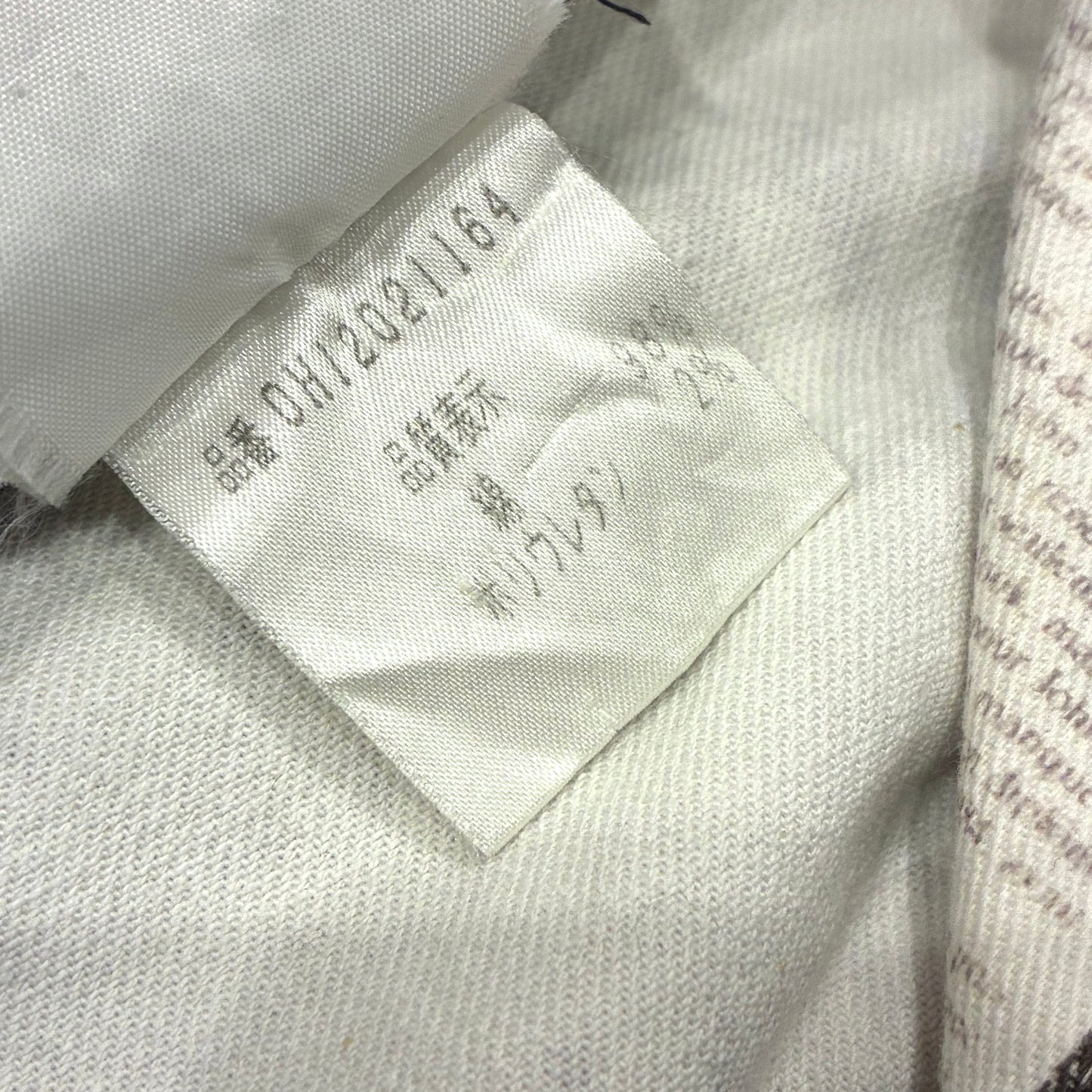 Christian Dior Fall 2000 Newspaper Jacket White