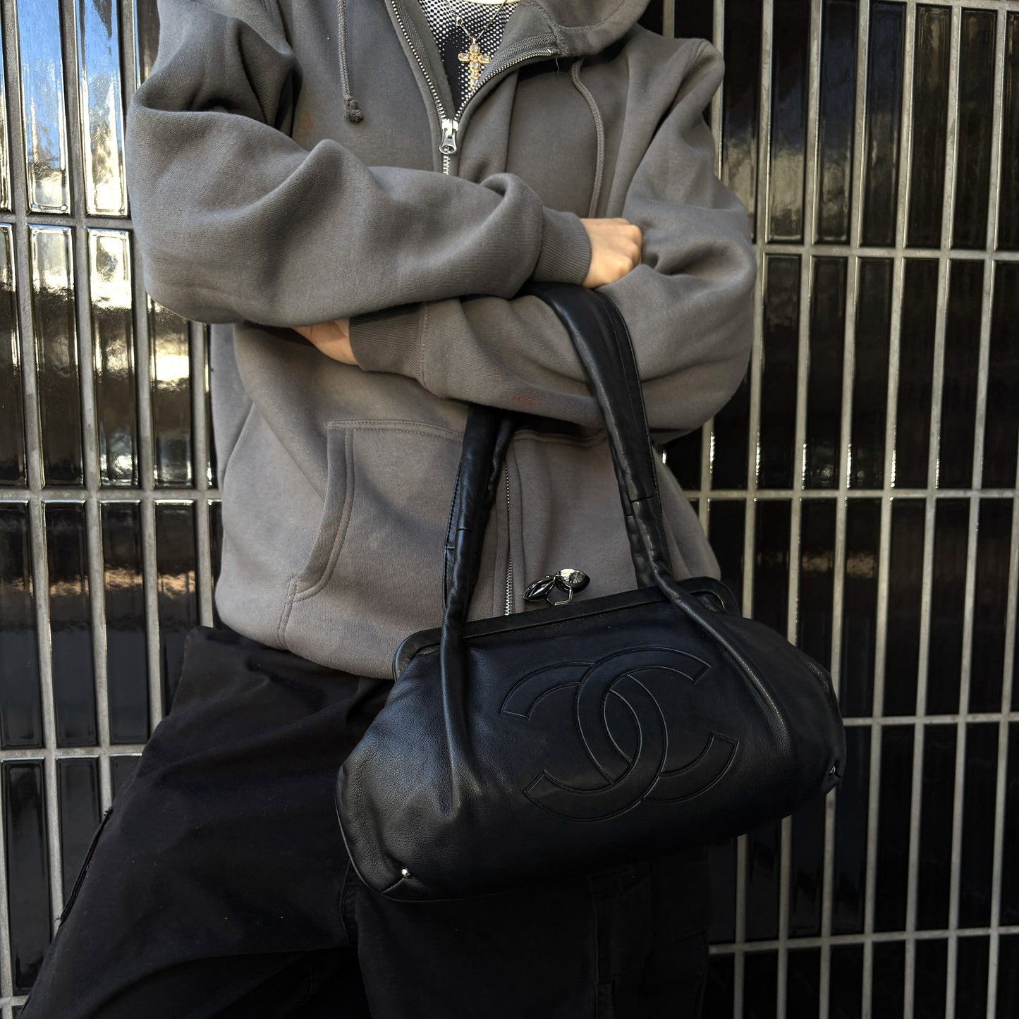 Chanel Black Lambskin Kiss Lock Handbag