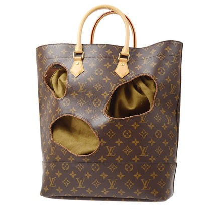 LOUIS VUITTON 2014 x Comme Des Garcons Bag with Holes M40279