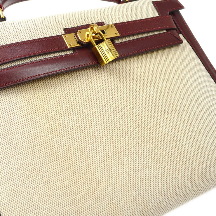 Hermes Kelly Handbag Toile And Rouge H Box Calf With Gold Hardware 32 at  1stDibs