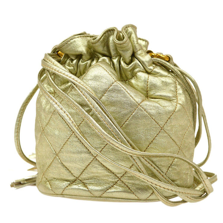 CHANEL 1989-1991 Gold Lambskin Drawstring Bucket Bag – AMORE Vintage Tokyo