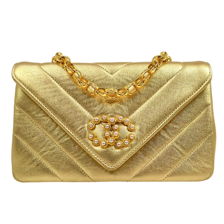 CHANEL 1991-1994 Gold Lambskin Chevron Faux Pearl CC Flap Bag – AMORE  Vintage Tokyo