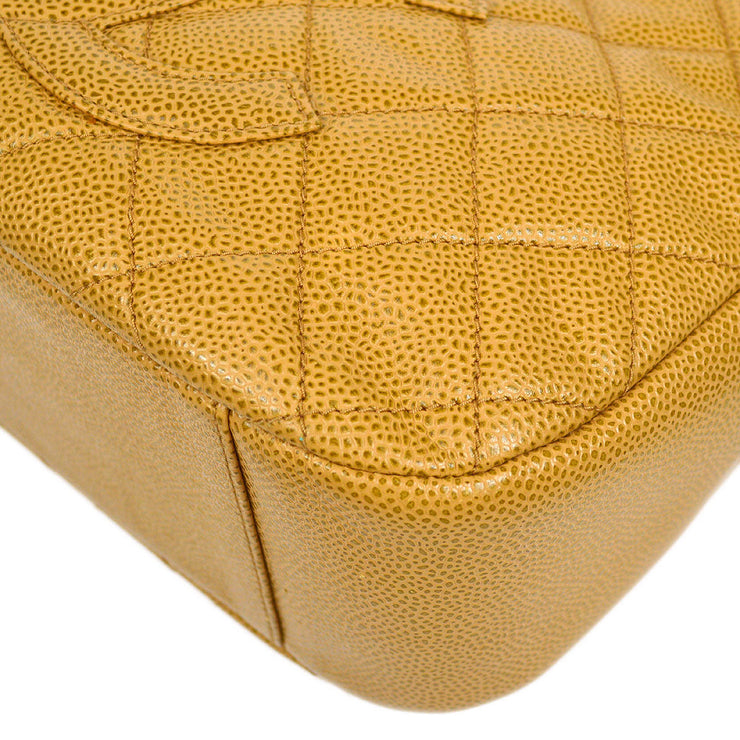 yellow chanel backpack caviar