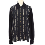 CHANEL ‘No Smoking’ silk blouse with knitted sleeves and collar