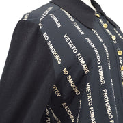 CHANEL ‘No Smoking’ silk blouse with knitted sleeves and collar