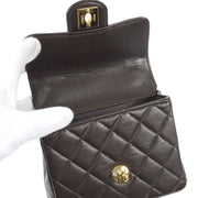 CHANEL 1994 Classic Flap Handbag Micro Brown Lambskin