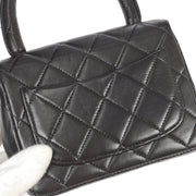 Chanel 1994 Classic Flap Handbag Micro Black Lambskin