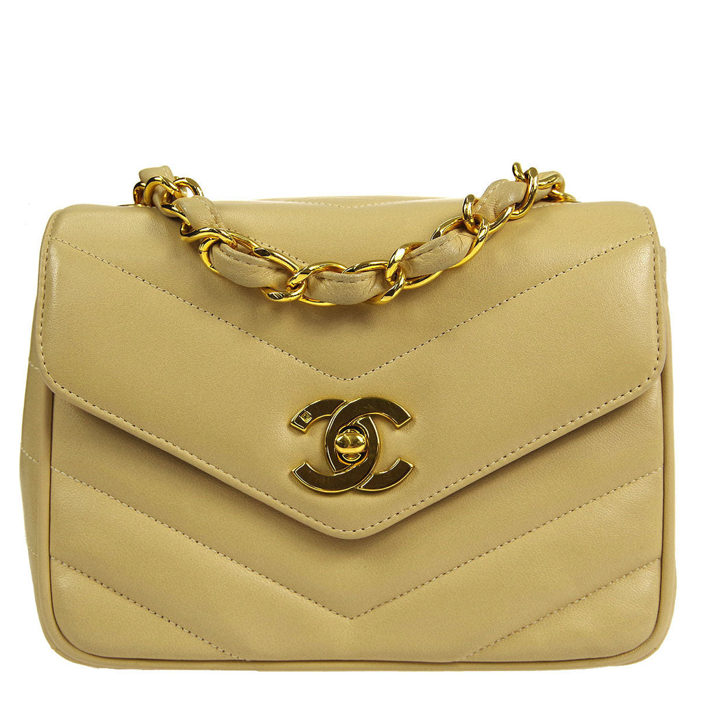 Chanel * 1994-1996 Beige Lambskin Mini Chevron Letter Flap Bag