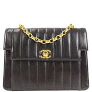 Chanel * 1991-1994 Black Lambskin Mini Vertical Stitch Flap Bag