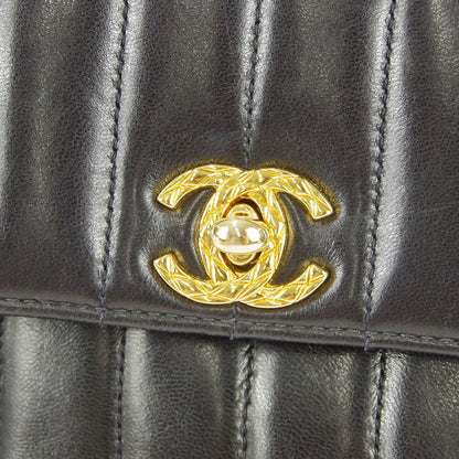 Chanel * 1991-1994 Black Lambskin Mini Vertical Stitch Flap Bag