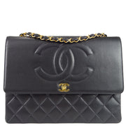 Chanel * 1991-1994 Black Lambskin Maxi Straight CC Flap