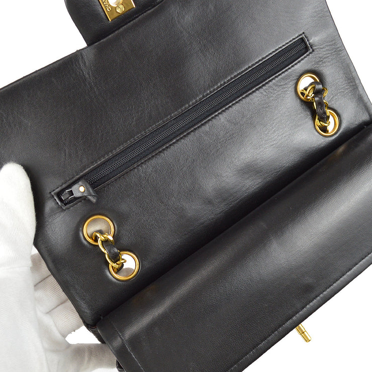 Chanel 1994-1996 Black Lambskin Medium Classic Double Flap Bag – AMORE  Vintage Tokyo