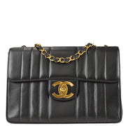 Chanel 1994-1996 Black Lambskin Jumbo Vertical Stitch Classic Flap Bag