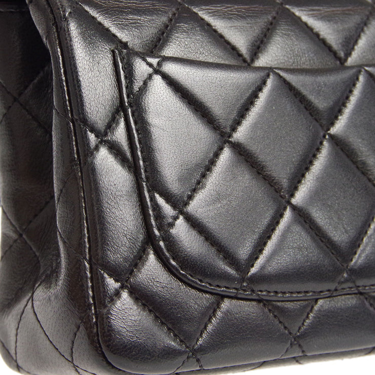 Chanel 1994 Black Lambskin Micro Classic Flap Handbag