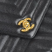 Chanel 1991-1994 Black Caviar Small Chevron Pocket Camera Bag