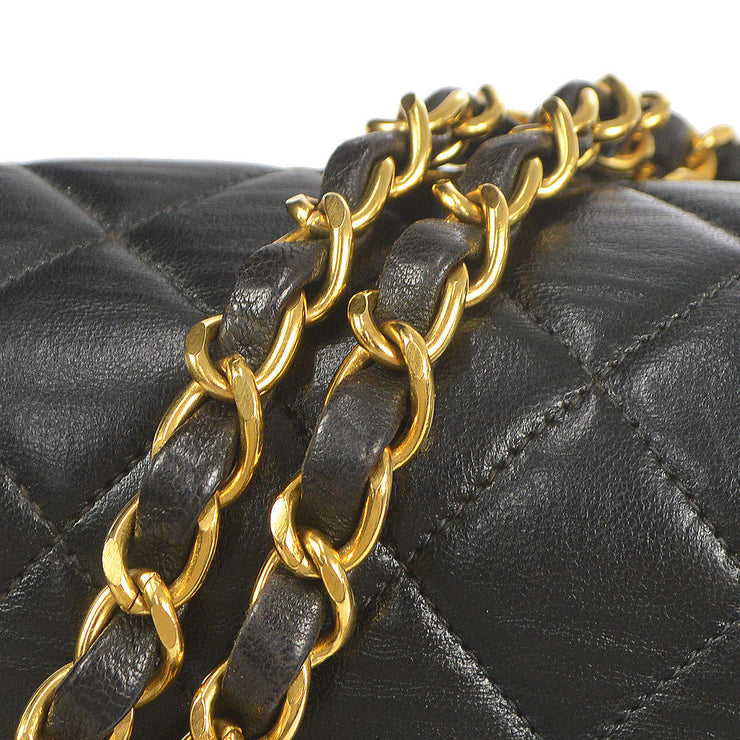 Chanel 1994-1996 Black Lambskin Small Classic Double Flap Shoulder Bag – AMORE  Vintage Tokyo
