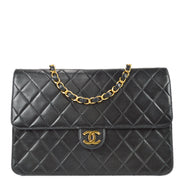 Chanel 1996-1997 Black Lambskin Medium Pushlock Half Flap Bag