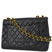 Chanel 1994-1996 Black Lambskin Maxi Classic Flap Bag